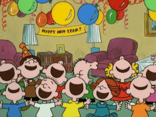 Children from Charlie Brown cartoon celebrating as baloons fall from the ceiling.
