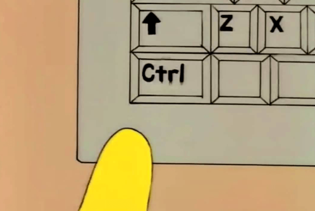 Homer Simpson's finger pointing at the 'Ctrl' key.